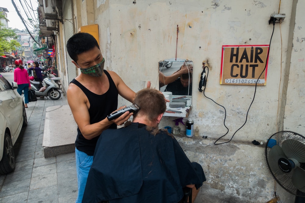 Getting a Haircut on the Street - Wandering the World