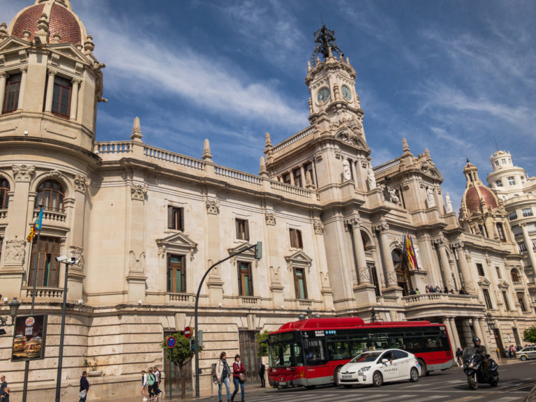 An EMT bus in front of city hall